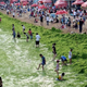 Illustration for article titled Algae invades Chinese beach, people still go swimming